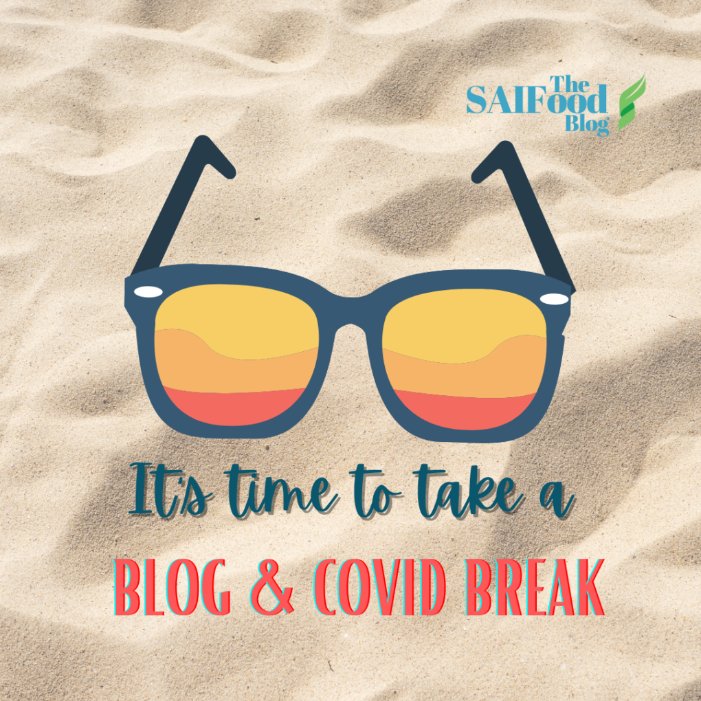 Sand background with a pair of sunglasses and the text Summer and covid break 2021